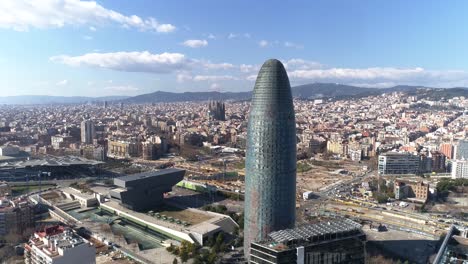 Aerial-view-of-Barcelona-City-Skyline,-Agbar-Tower,-Spain