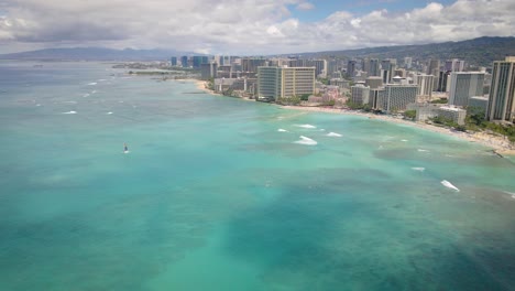 Beach-aerial-drone-view-in-Waikiki,-Honolulu,-Oahu,-Hawaii