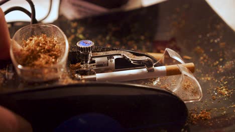 Creating-cigarette-with-small-machine-using-tobacco