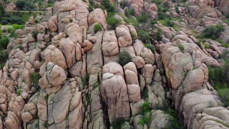 Flying-over-Boulders-on-Watson-Lake,-Prescott,-Arizona