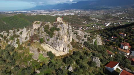 Strategic-Citadel:-Ancient-Petrela-Castle,-Perched-on-a-Massive-Rock,-Overlooking-Majestic-Mountains-in-a-Commanding-Position-for-Battle