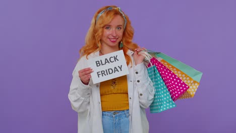 Happy-stylish-girl-showing-Black-Friday-inscription-banner-text,-advertising-discounts,-low-prices