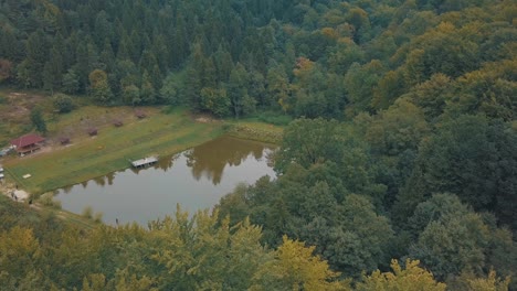 The-Lake-in-the-middle-of-a-forest.-View-from-the-top.-Autumn.-Aerial