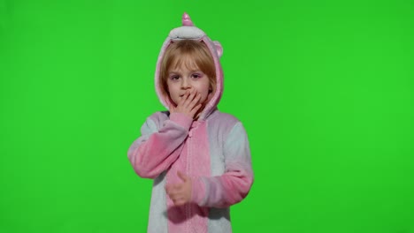 Amazed-astonished-young-kid-girl-in-unicorn-costume-pajamas-showing-wow-reaction,-perfect-surprise