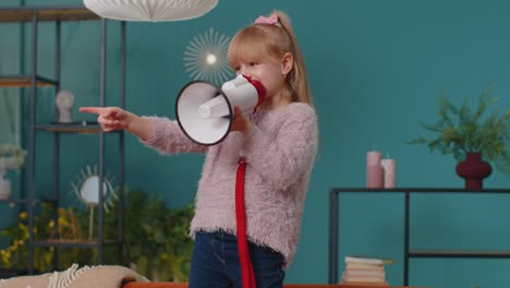 Child-girl-kid-standing-on-sofa-at-home-alone-loudly-shout-in-megaphone-announces-discounts-sale