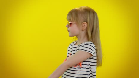 Happy-joyful-child-kid-girl-in-sunglasses-listening-music-dancing-disco,-fooling-around,-having-fun