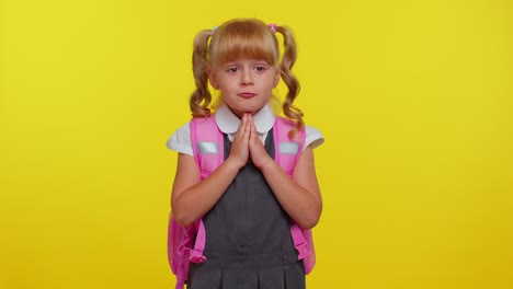 Teenage-student-girl-kid-in-school-uniform-praying,-looking-upward-and-making-wish,-begging-apology