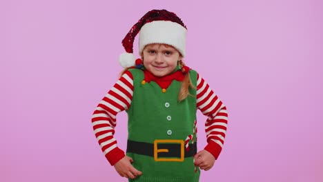 Displeased-girl-in-Christmas-costume-gesturing-hands-with-displeasure,-blaming-scolding-for-failure