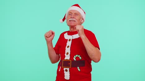 Senior-Christmas-old-grandfather-man-listening-music-via-earphones,-dancing-fun-disco-fooling-around