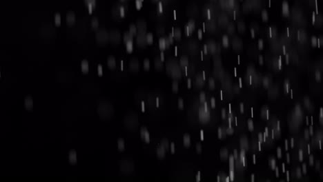 Real-rain-drops-falling-or-snow-4K-alpha-channel-footage.-Heavy-rain-fall,-rainstorm,-snowfall