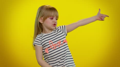 Little-kid-child-girl-pointing-around-with-finger-gun-gesture,-making-choice-shooting-killing-pistol