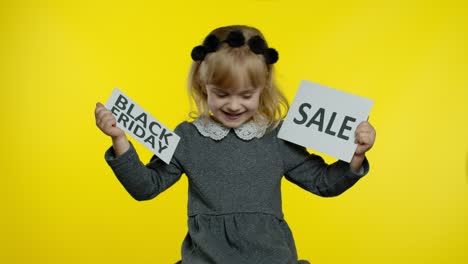 Child-kid-showing-Black-Friday-and-Sale-word-discount-advertisement-banners.-Low-prices,-shopping