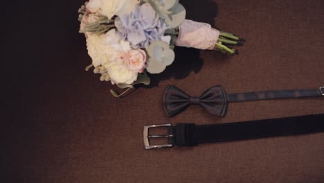 Beautiful-wedding-bouquet,-groom's-bow-tie-and-belt.-Wedding-accessories