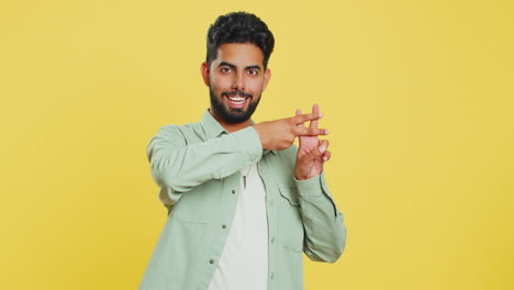 Indian-young-man-showing-hashtag-symbol-with-fingers-popular-viral-social-media-internet-content