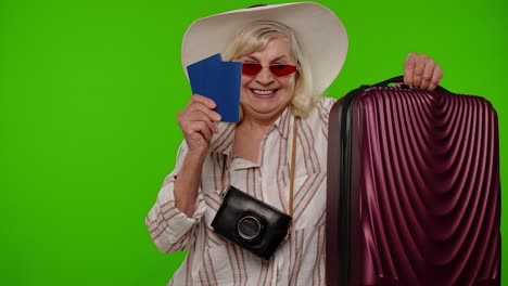 Traveler-tourist-senior-woman-celebrating,-holding-passport,-tickets,-luggage,-summer-vacation