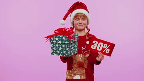 Toddler-girl-in-Christmas-hat-showing-gift-boxes-and-30-Percent-discount-inscriptions-banner-text