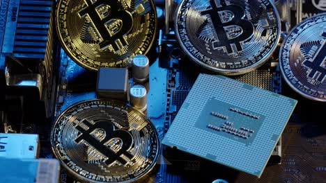 Bitcoin-BTC-and-CPU-central-processor-on-digital-technology-pc-motherboard,-mining-cryptocurrency