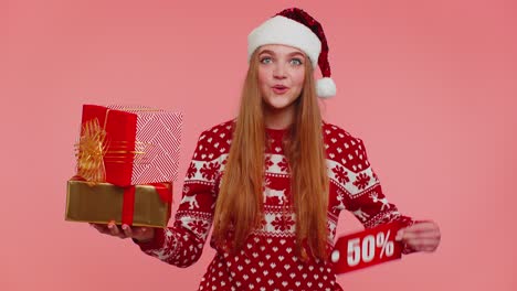 Girl-in-red-Christmas-sweater-showing-gift-box-and-50-Percent-discount-inscriptions-banner-text-note