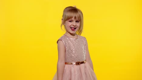 Child-laughing,-fooling-around,-showing-tongue.-Little-blonde-teen-kid-girl-5-6-years-old-posing