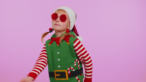 Chica-Navidad-Papá-Noel-Duende-Escuchando-Música-A-Través-De-Auriculares-Bailando-Discoteca-Jugando-Divirtiéndose