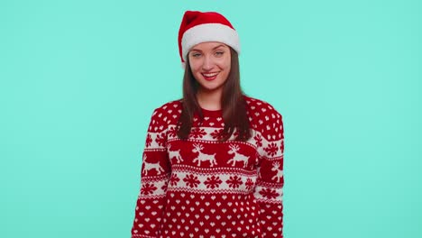 Young-adult-girl-in-Christmas-sweater-listening-music,-dancing-disco-fooling-around-having-fun