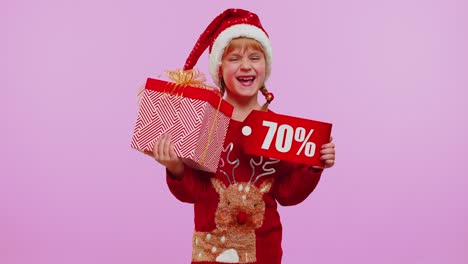 Girl-kid-in-red-Christmas-hat-showing-gift-box-and-70-Percent-discount-inscriptions-banner-text-note