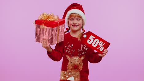 Child-girl-in-Christmas-hat-showing-gift-box-and-50-Percent-discount-inscriptions-banner-text-note