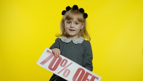 Child-girl-showing-Up-To-70-percent-Off-inscription-low-prices,-advertising-discounts,-smiling