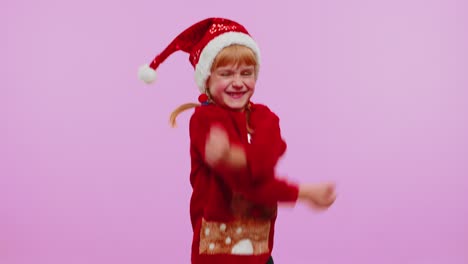 Cheerful-girl-kid-in-sweater-Christmas-Santa-shouting,-celebrating-success,-winning,-goal-achievemen