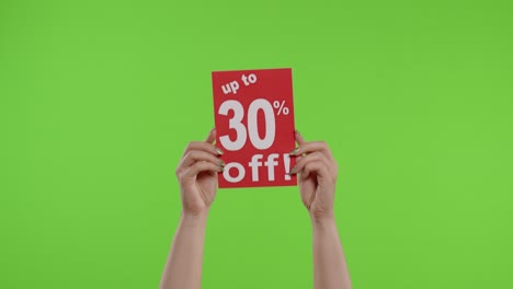 Up-To-30-Percent-Off-advertisement-inscription-on-paper-sheet-in-womans-hands-on-chroma-key