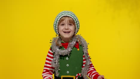 Kind,-Kind,-Teenager-Mädchen-In-Weihnachtself-Santa-Helfer-Kostüm-Spaß-Freut-Sich-über-Konfetti-Regen