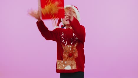Cheerful-girl-in-sweater-Santa-Christmas-getting-present-gift-box,-expressing-amazement-happiness