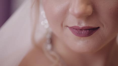Beautiful-and-lovely-bride.-Close-up-shot-of-bride's-lips.-Wedding-morning