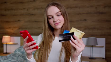 Girl-pays-for-purchases-shopping-in-web-during-sale-discounts,-ordering-food-with-debit-plastic-card