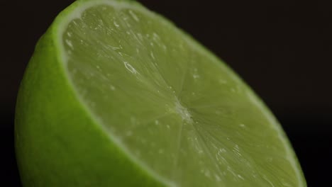 Delicious-lime-cut-for-squeezing-fresh-juice.-Lime-half