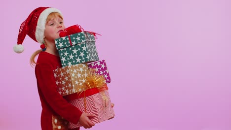 Girl-in-Christmas-sweater,-Santa-hat,-smiling,-holding-many-gift-boxes-New-Year-presents-shopping