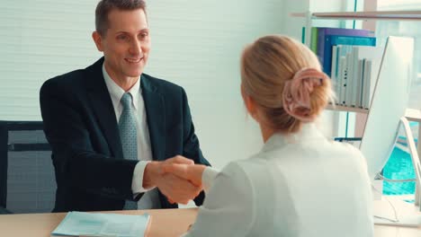 Job-seeker-and-manager-handshake-in-job-interview