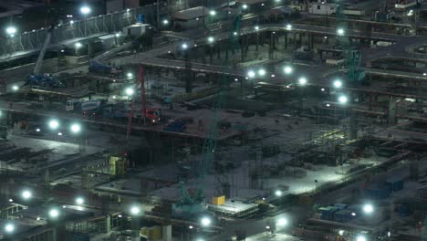 Time-lapse-of-construction-site-with-heavy-construction-machinery-in-metropolis
