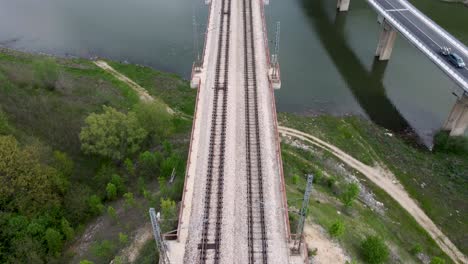 Train-and-highway-bridge-crossing-Tsonevo-reservoir,-Bulgaria