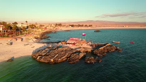 Flyover-of-turquoise-waters-of-Bahia-Inglesa-beach-in-the-Coquimbo-region,-Chile