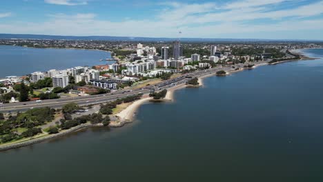 Aerial-of-busy-highway-road-along-the-Swan-River