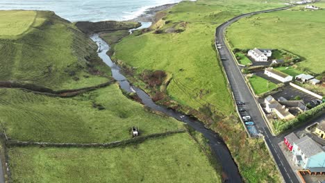 Drone-static-of-Doolin-Village-with-river-leading-to-the-Atlantic-sea-wild-Atlantic-way