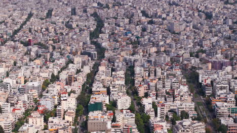 Enger-Luftschieber,-Aufgenommen-über-Weißen-Gebäuden-In-Athen