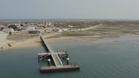 Aerial-View-Of-Culatra-Island-Pier-In-Faro,-Portugal