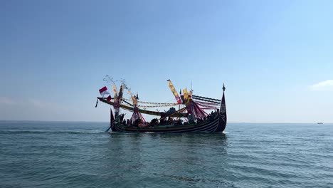 Beautifully-decorated-fishing-boat-during-in-Banyuwangi-during-Patik-Laut-festival-in-Indonesia,-Muncar-village