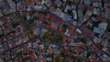 Top-down-aerial-shot-over-old-town-Athens-at-night
