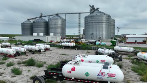 Grain-silos-with-conveyor-and-anhydrous-ammonia-tanks-in-front