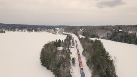 Train-going-through-the-winter-mountains