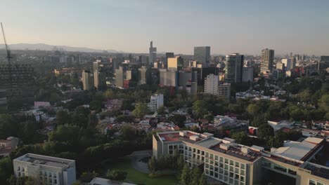 Aerial-views-of-buildings-on-Insurgentes-Avenue-in-Mexico-City,-captured-from-a-drone