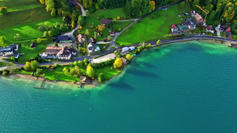 Beautiful-descending-drone-footage-above-the-blue-water-of-the-Attersee-in-Austria